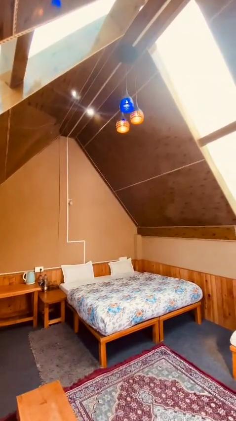 The Bushman Lodge Jibhi - Tap to explore photos