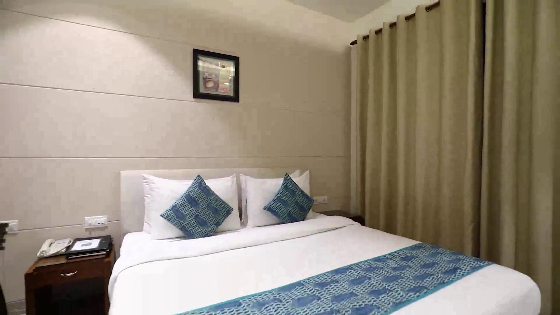 Cosy Grand @Chanakyapuri by The Cosy Hotels - Tap to explore photos