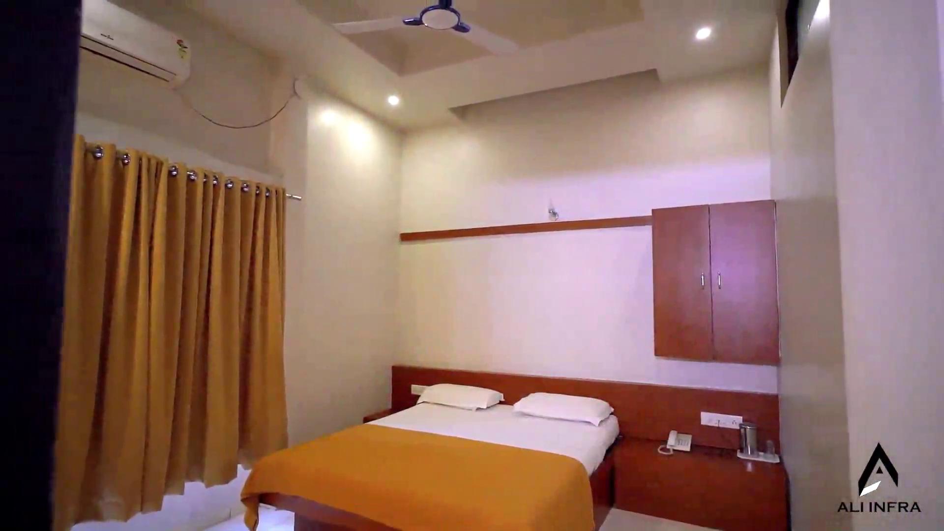 Hotel Adarsh Deluxe - Tap to explore photos