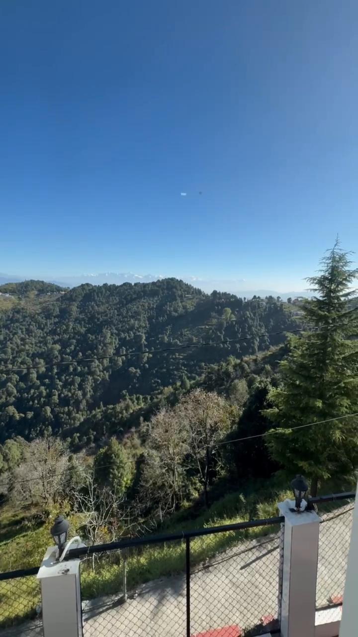 Kanatal Pinnacle House - Tap to explore photos