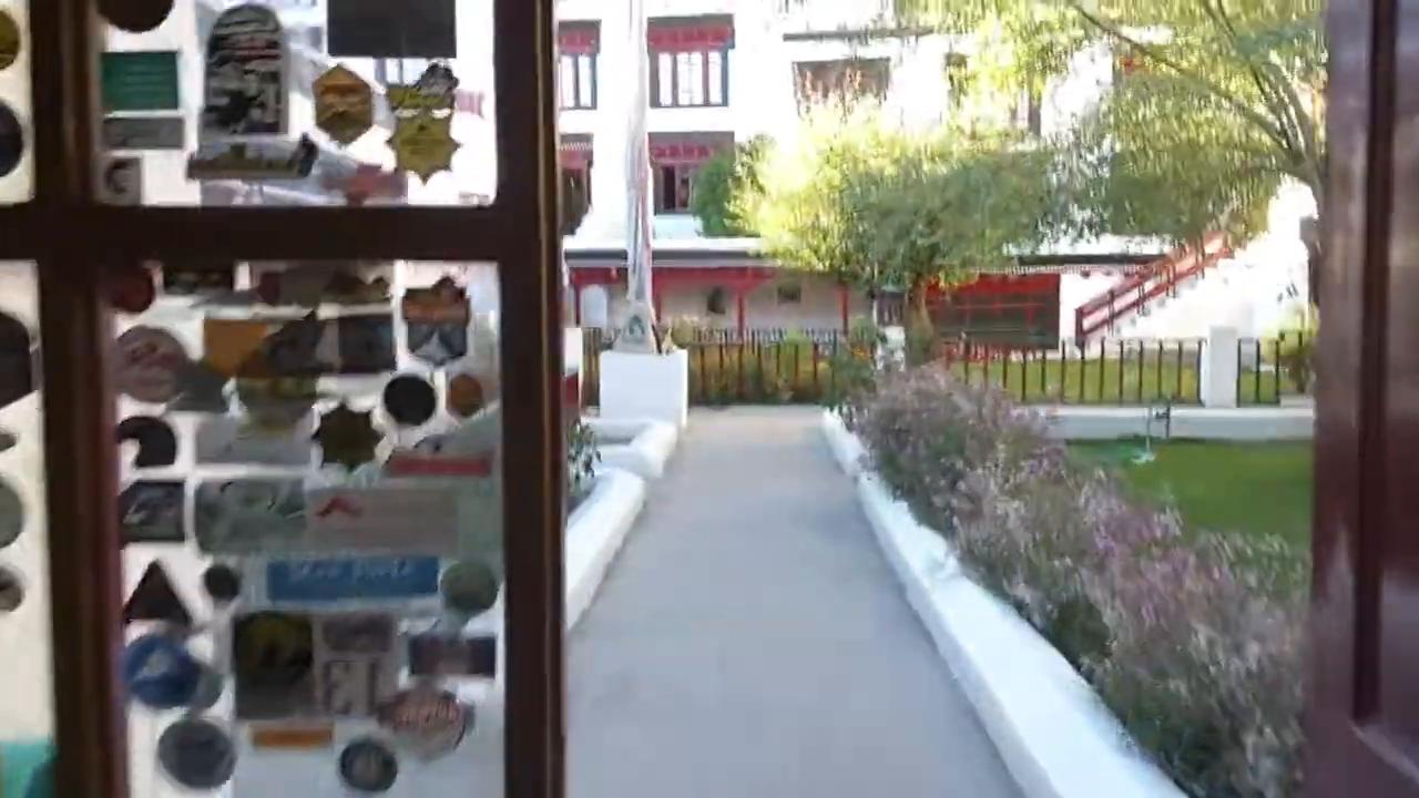 Lharimo Hotel - Tap to explore photos