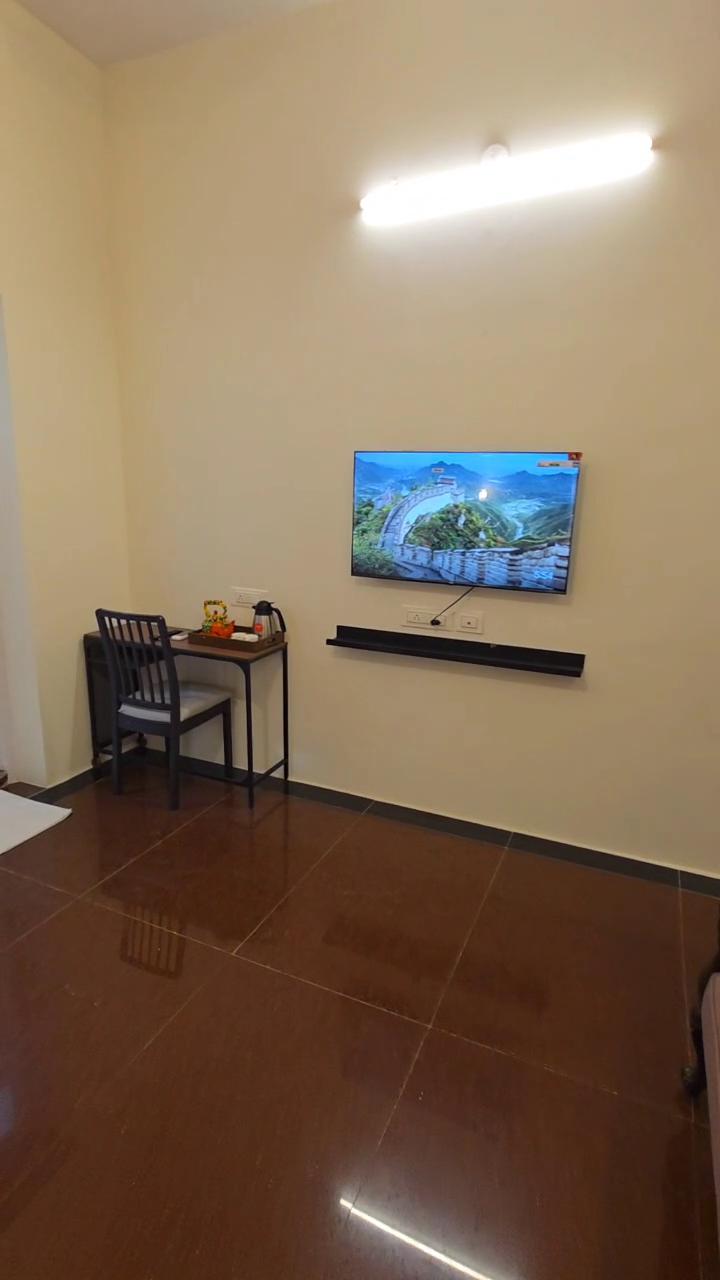 Service Apartment In Malabar Hill by Flora Stays - Tap to explore photos