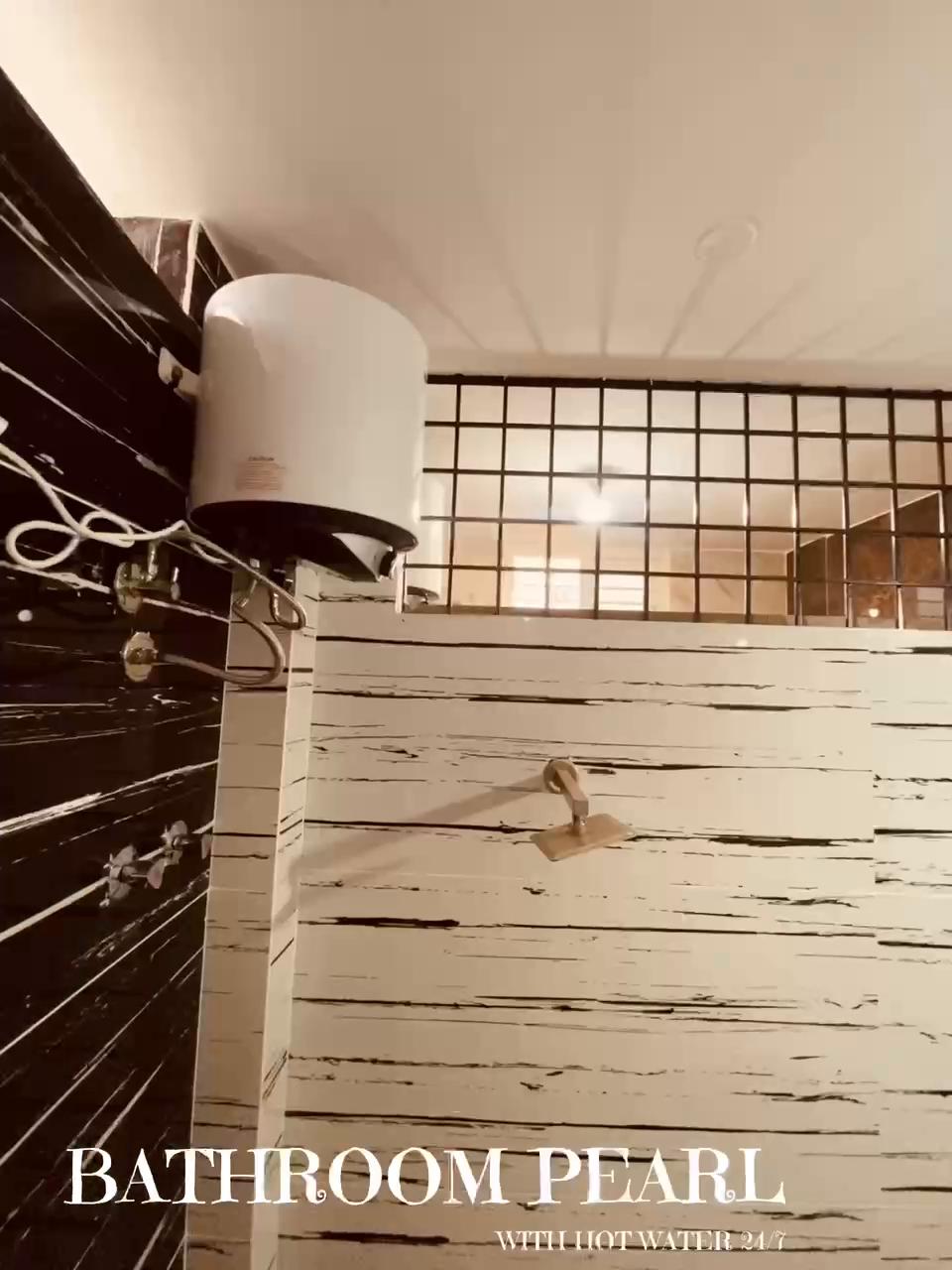 IROOMZ Eco Brickmark Serviced Apartments - Tap to explore photos