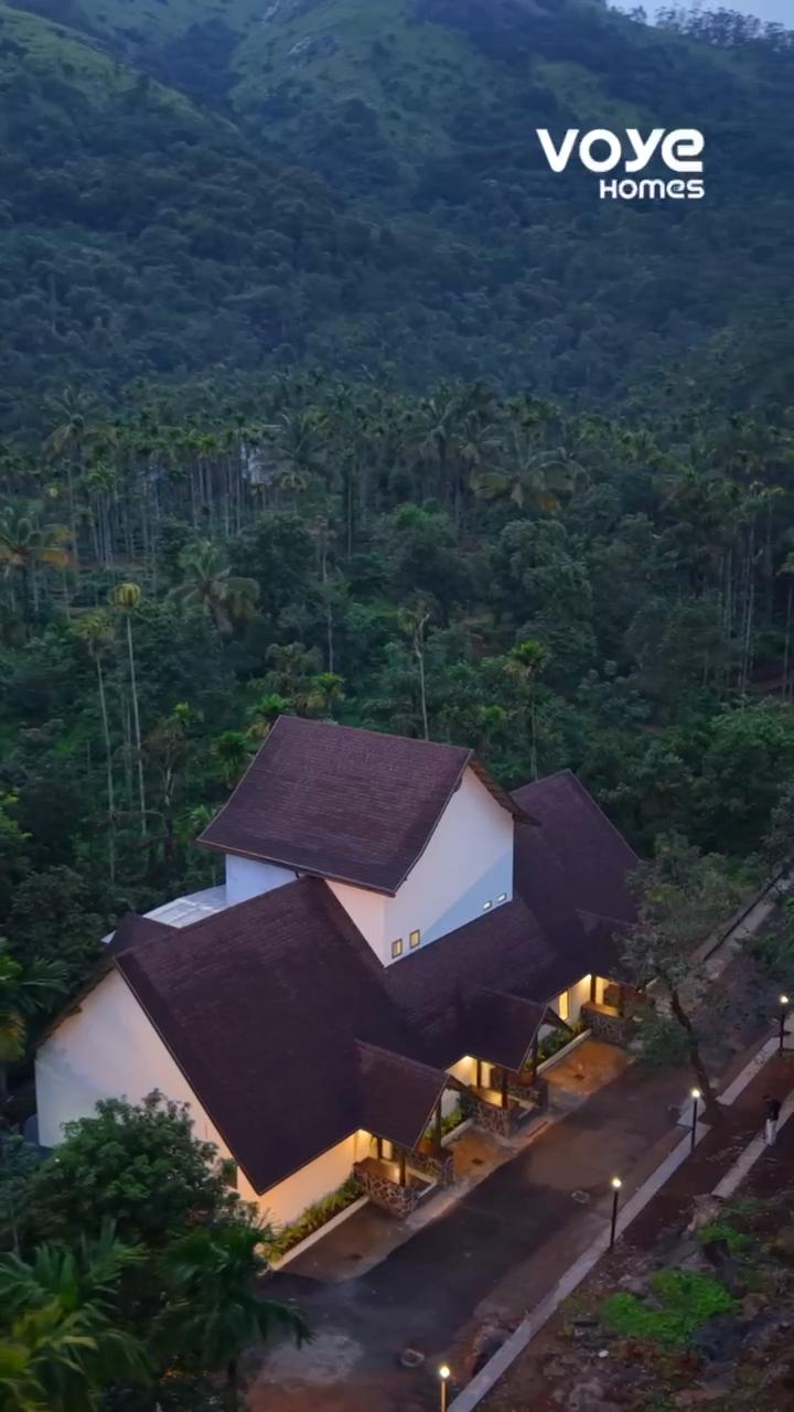 ACHUTHAM BANASURA VILLA BY VOYE HOMES - Tap to explore photos